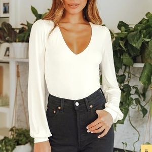 Lulu’s “Kaylene Ivory V-neck Balloon Sleeve Bodysuit”